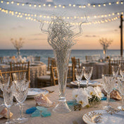 Silver sparkle curly ting stems in a glass vase on a beachside wedding table - thumbnail number 3