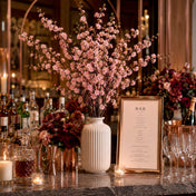 45" pink cherry blossom branches in a white vase on a bar setup - thumbnail number 5