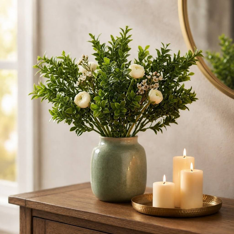 Green boxwood sprays with white flowers in a green ceramic vase - thumbnail number 6