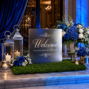 Faux moss leaf and twig mat styled under a welcome sign and blue floral arrangement - thumbnail number 3