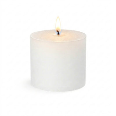 White pillar candle with lit flame isolated on white background - thumbnail number 4