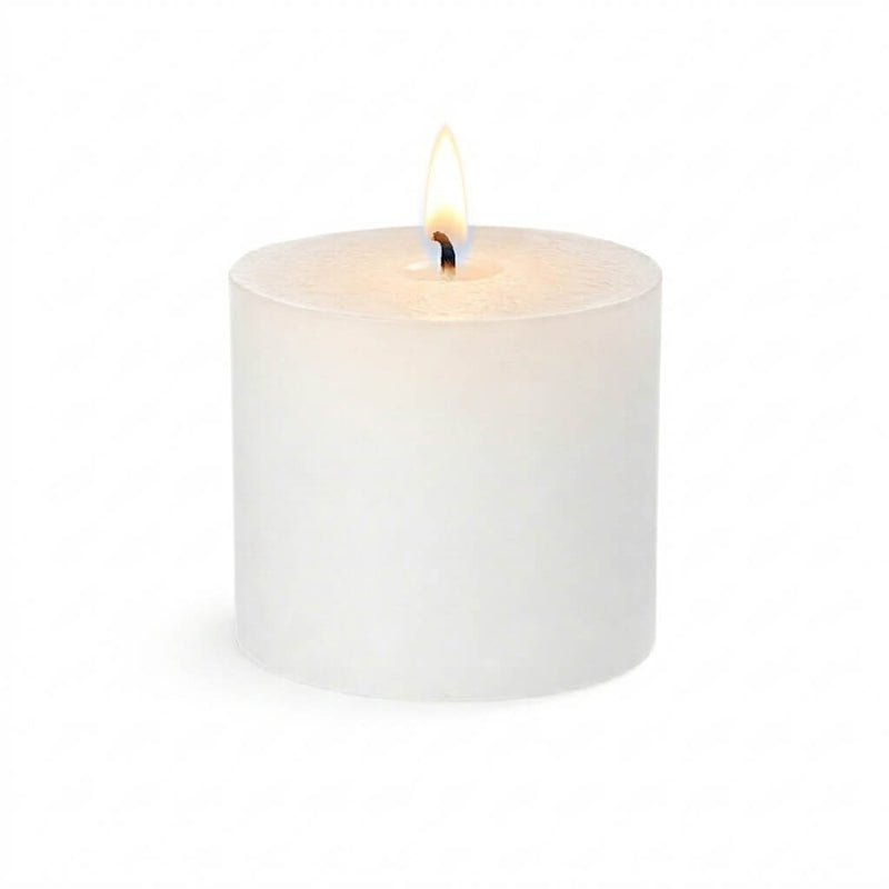 White pillar candle with lit flame isolated on white background - thumbnail number 4