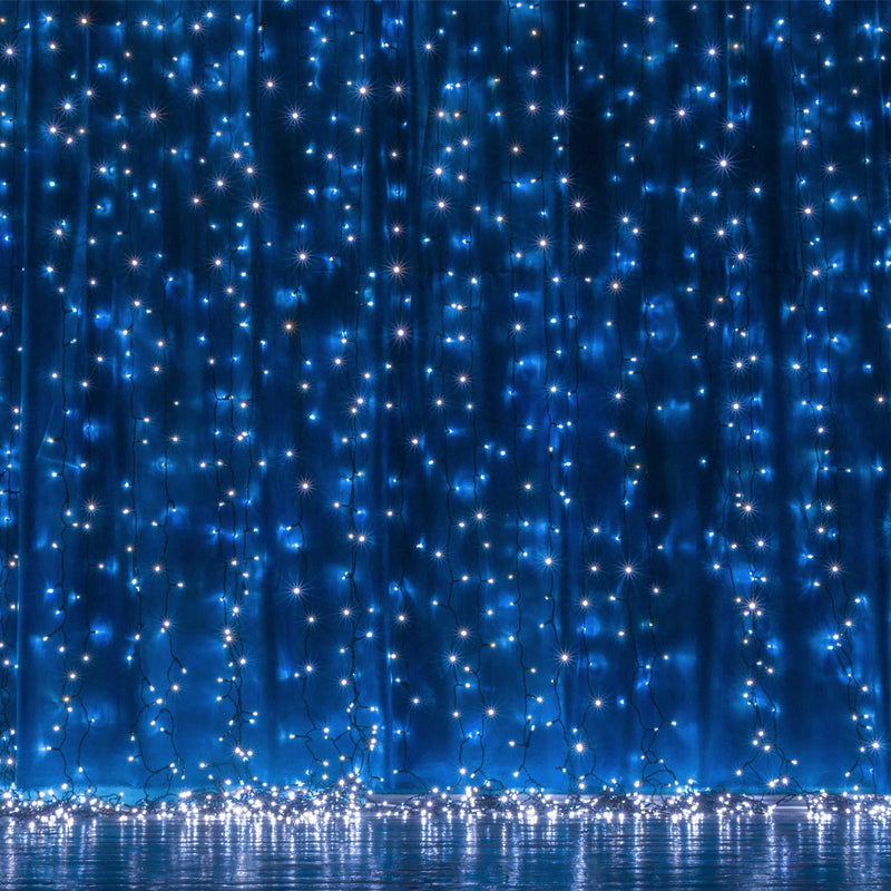 Blue curtain LED string lights glowing against dark blue backdrop - thumbnail number 1