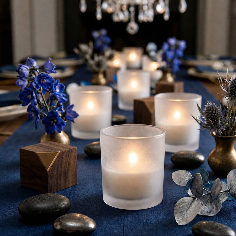 Frosted glass votive candles on elegant blue floral dinner table centerpiece - thumbnail number 4