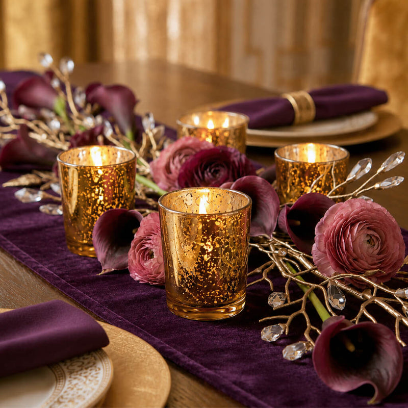 Amber Gold Mercury Votive Holders with lit candles on a plum runner with calla lilies - thumbnail number 5