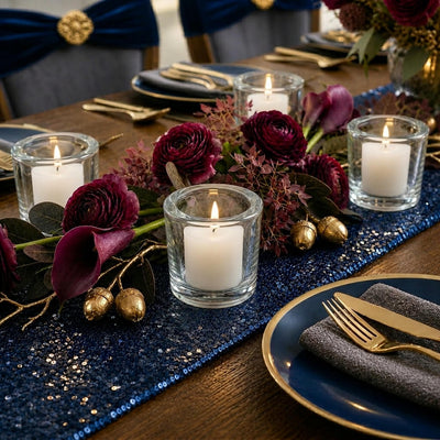 Navy and gold tablescape with glass candle holders and burgundy floral centerpiece - thumbnail number 8