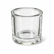 Clear glass cylindrical candle holder with thick base on white background - thumbnail number 1