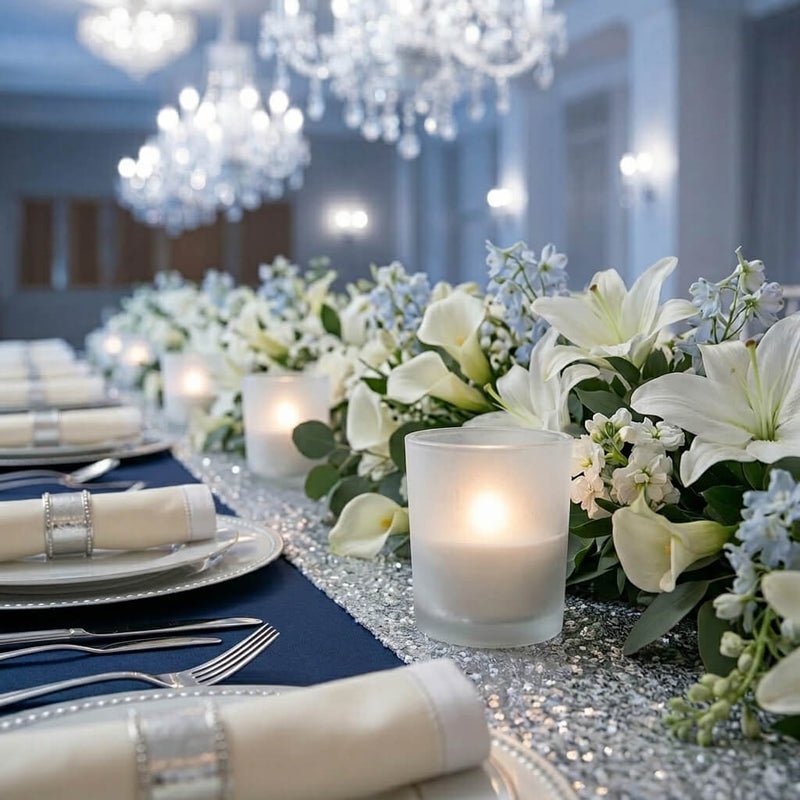Formal tablescape with white florals, frosted candle holders, and sparkling runner - thumbnail number 4