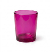 Empty pink glass votive holder on a solid white background - thumbnail number 1