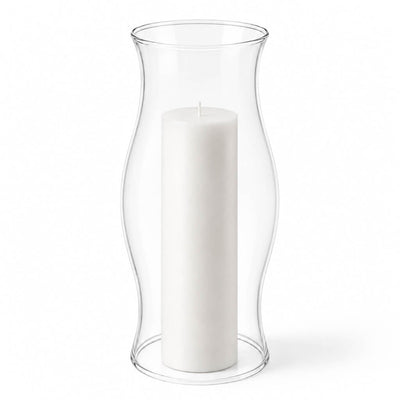 Unlit white pillar inside a clear glass Hurricane Pillar Candle Lamp over a solid white surface - thumbnail number 2