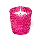Pink hobnail glass votive holder with lit candle on white background - thumbnail number 3