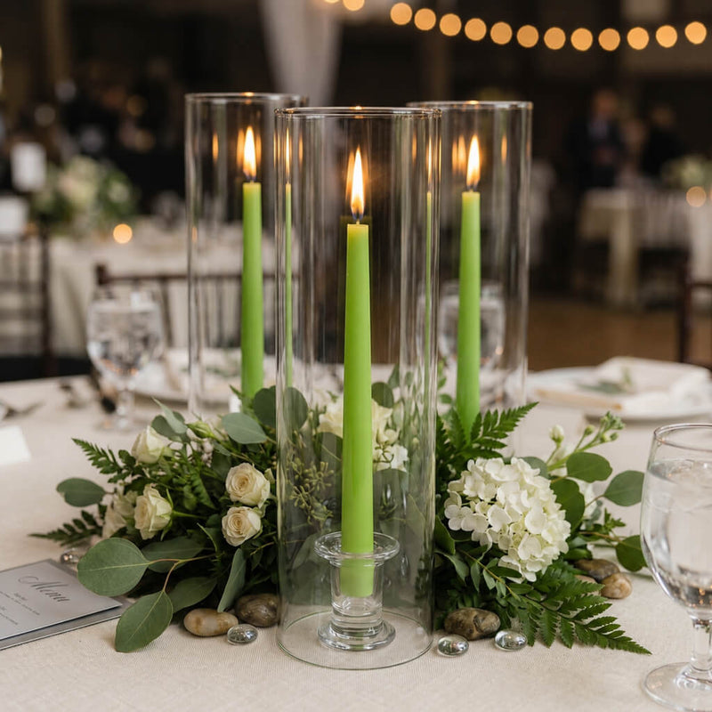 Green taper candles in clear glass holders with floral arrangement - thumbnail number 5