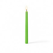 Single green taper candle with flame on white surface - thumbnail number 2