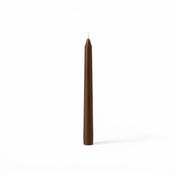 Unlit brown taper candle isolated on white background - thumbnail number 1