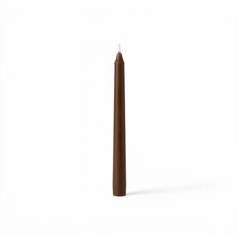 Unlit brown taper candle isolated on white background - thumbnail number 1