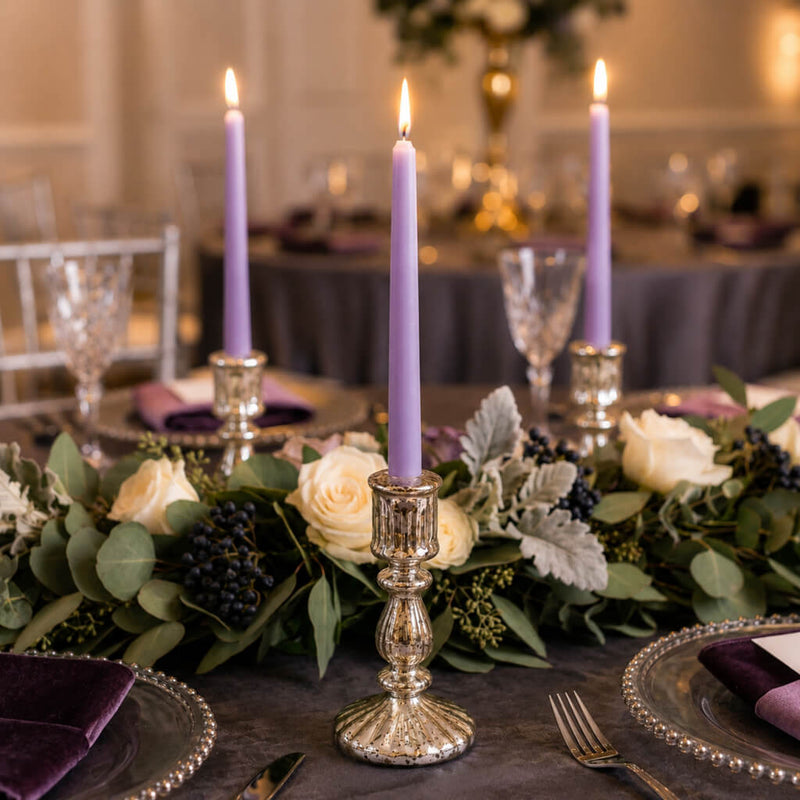 Lavender taper candles with greenery and white roses on dining table - thumbnail number 4