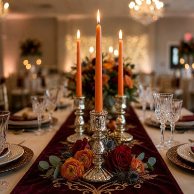 Romantic autumn table setting with orange candles and floral centerpiece - thumbnail number 4