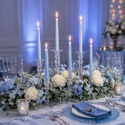 Light blue taper candles on elegant floral centerpiece table decor - thumbnail number 4