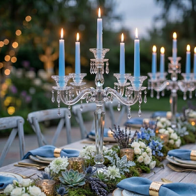 Light blue taper candles on crystal candelabras at elegant outdoor dinner table decor - thumbnail number 3