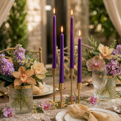 Lit purple taper candles with orchids and pastel floral table decor - thumbnail number 3
