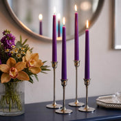 Purple taper candles and floral arrangement on modern tabletop decor - thumbnail number 6