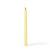 Lit ivory taper candle isolated on white background - thumbnail number 2