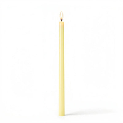 Ivory taper candle burning on white background - thumbnail number 2