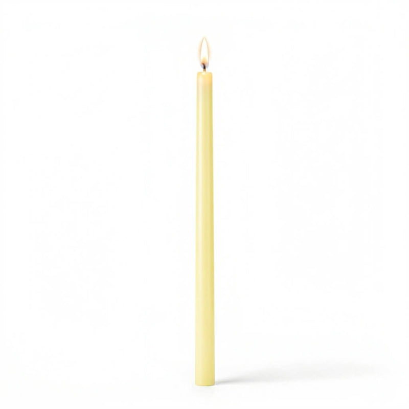 Ivory taper candle burning on white background - thumbnail number 2