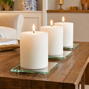 A clean and intentional home display featuring a trio of clear glass Square Coaster 4" pieces - thumbnail number 9