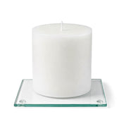 An unlit white pillar candle centered on a clear glass Square Coaster 4" on white background - thumbnail number 4