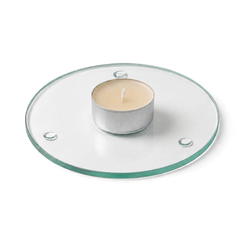 An unlit tealight candle on a clear glass Round Coaster 4" against a white backdrop - thumbnail number 4