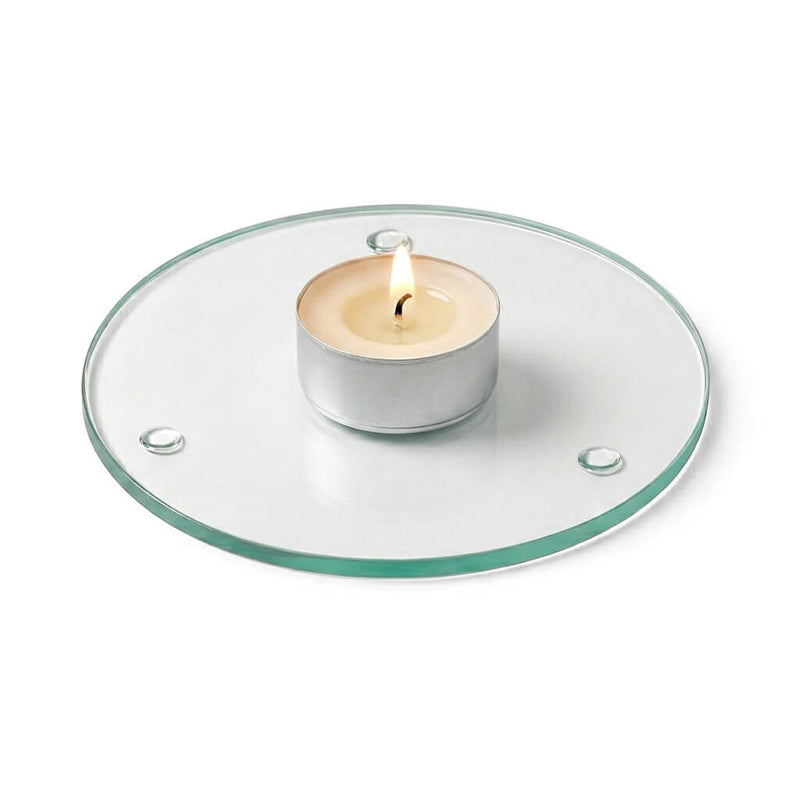 A lit tealight candle on a clear glass Round Coaster 4" against a white backdrop - thumbnail number 5