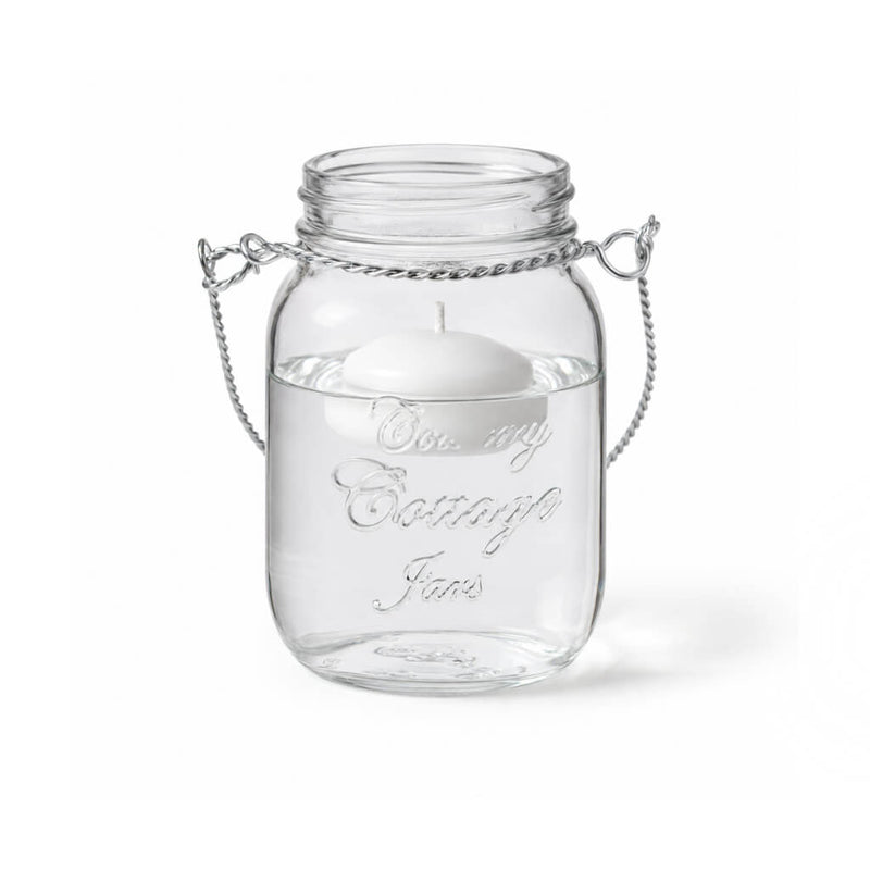 A Small Mason Jar with Handle and floating white candle - thumbnail number 2