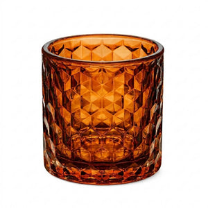 Amber chunky honeycomb glass votive and tealight holder on white background