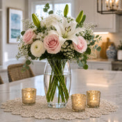 10" clear vase with pink roses and white lilies on a doily - thumbnail number 9