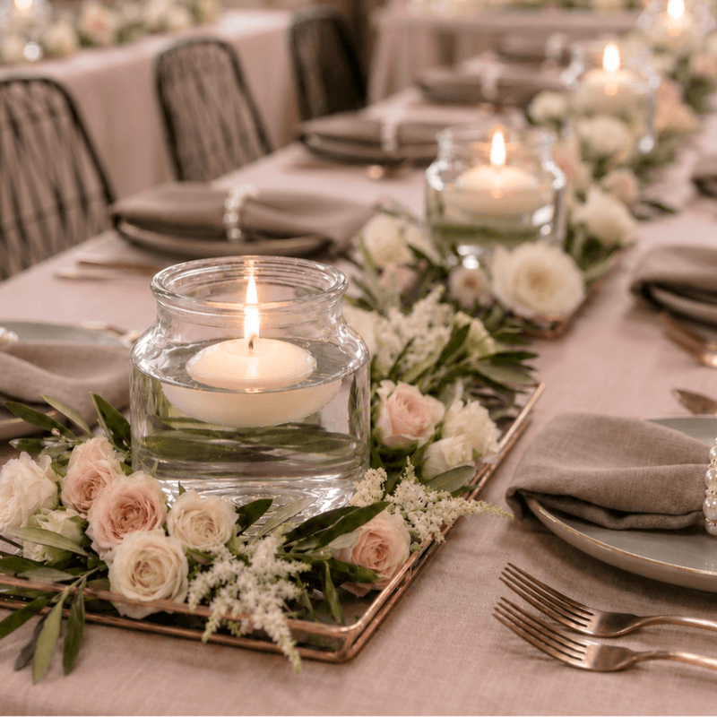 Floating white candles in the Etta Vase on a luxury garden gala tablescape - thumbnail number 5