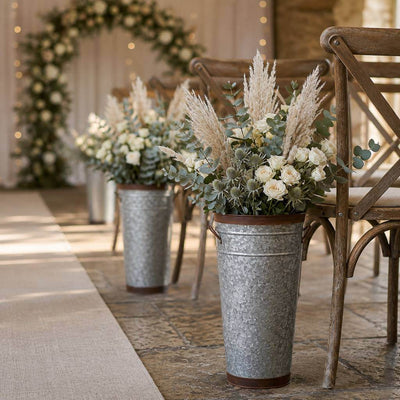 Two-tone French flower market bucket with pampas grass and roses along a wedding aisle - thumbnail number 9