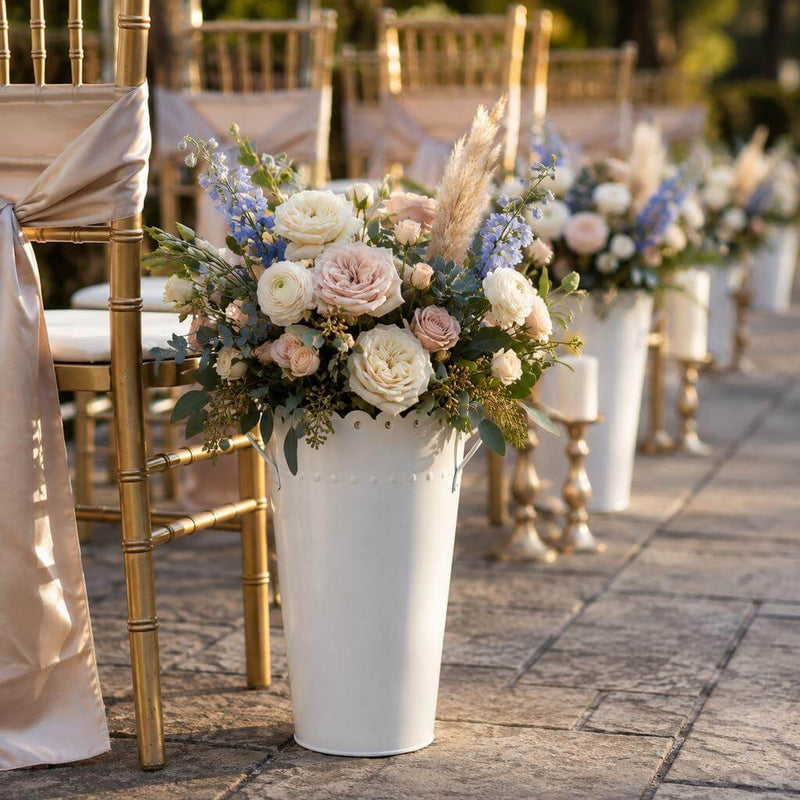 White scalloped flower market bucket with floral arrangement beside gold chairs - thumbnail number 2