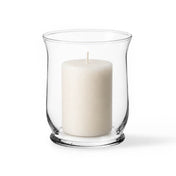 A classic clear glass 6" Hurricane Vase featuring an unlit candle against a white background - thumbnail number 2