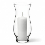 White pillar candle inside a clear hurricane glass vase on a white background - thumbnail number 2