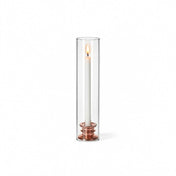 Glass Chimney Candle Shade 2.5" x 12" open tube over a lit taper candle on a solid white backdrop - thumbnail number 3