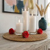Red preserved roses surround three cylinder candles on a woven tray - thumbnail number 4