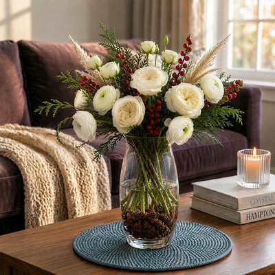 Floral arrangement with tiny hemlock pine cones in a glass vase - thumbnail number 6