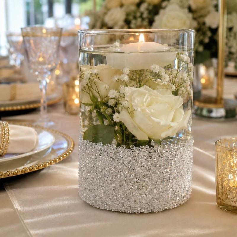 Glass vase with German glass glitter holding white roses and a floating candle - thumbnail number 7