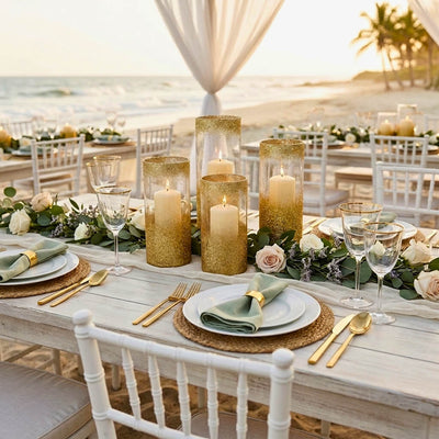 Gold glitter glass candle holders on a beach wedding table runner - thumbnail number 7