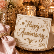 Happy Anniversary card adorned with sparkling gold glass glitter on a table setting - thumbnail number 8