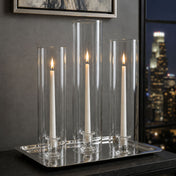Simple Glass Taper Candle Holder trio with lit candles inside chimney shades on a silver tray - thumbnail number 7