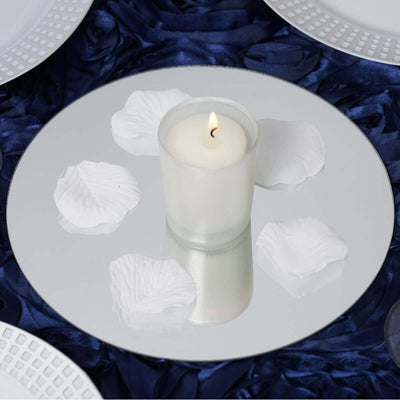 Candle centerpiece with white petals on a mirrored plate - thumbnail number 1