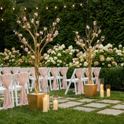 Two potted gold faux manzanita trees with pink flowers flanking outdoor seating - thumbnail number 4