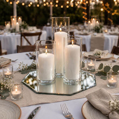 Candles in glass cylinders on an octagonal mirror centerpiece for a wedding table setting - thumbnail number 7